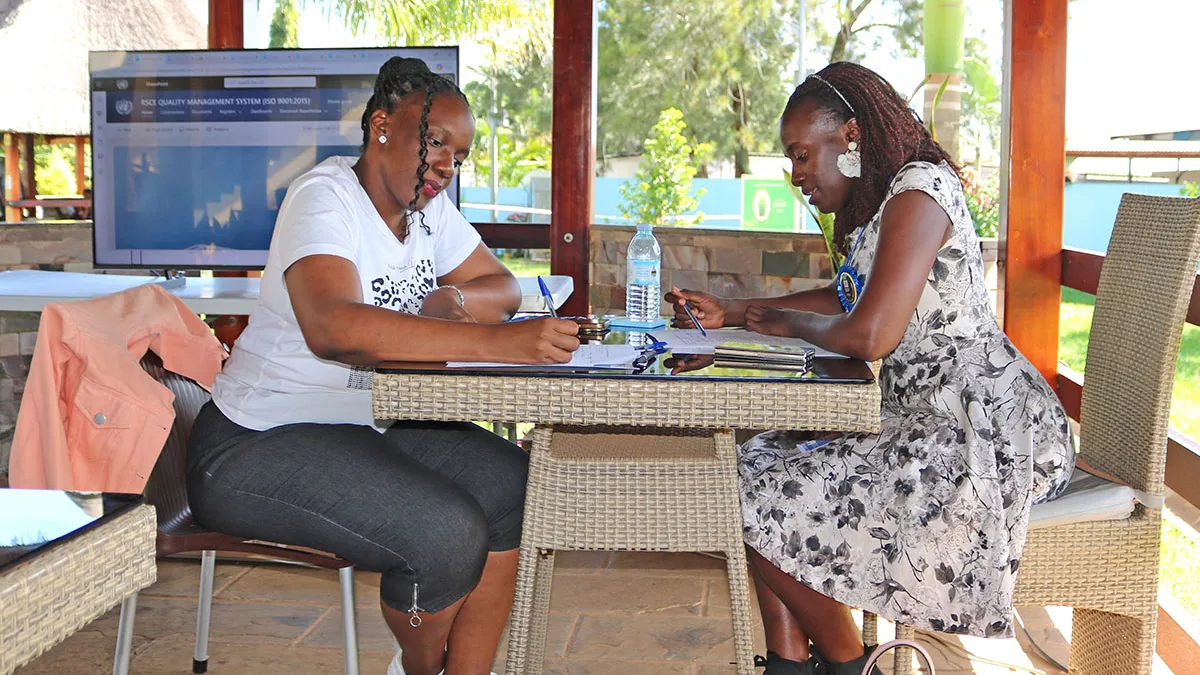 RSCE staff member checks with ISO Consultant on their readiness for the ISO 9001:2015 audit RSCE staff member checks with ISO Consultant on their readiness for the ISO 9001:2015 audit