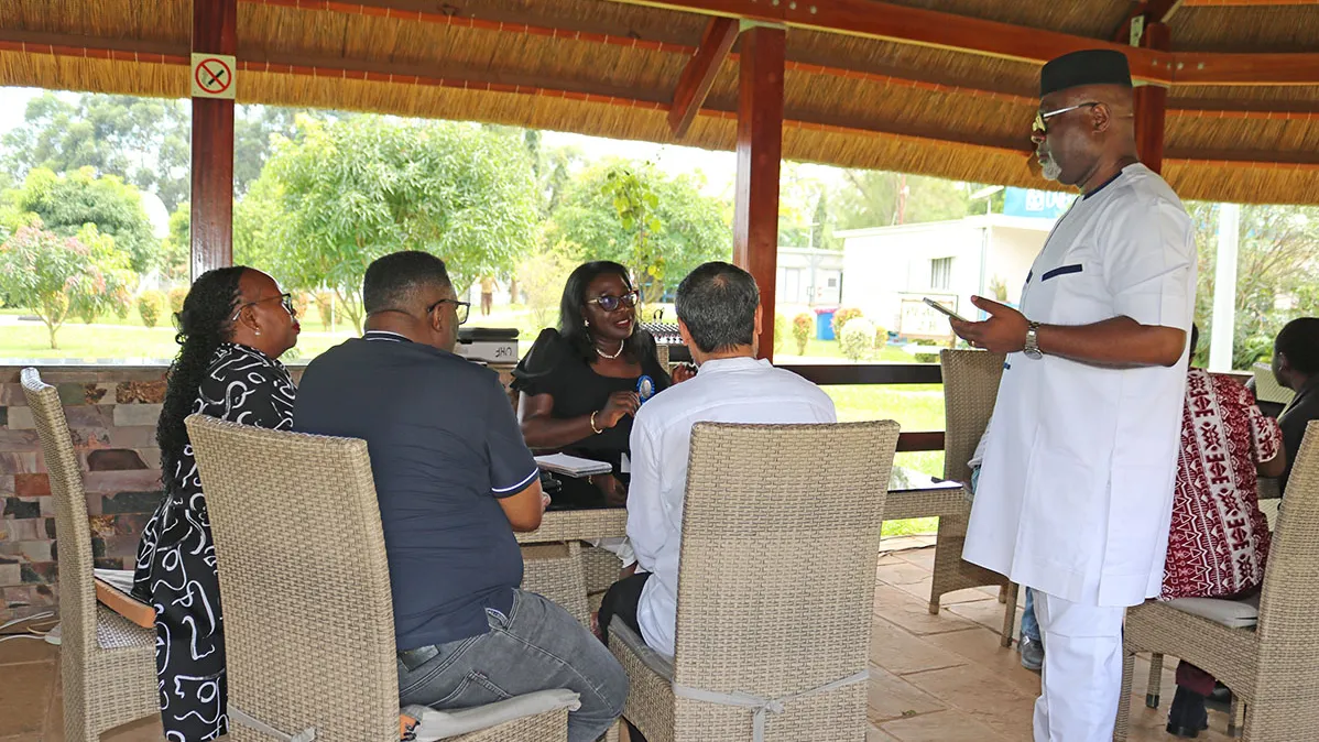 Director RSCE, Mr. Paulin Djomo (standing) talks to Chief LARRMU, Elise Metougue and some RSCE staff members on the importance of the ISO Awareness Clinic. Director RSCE, Mr. Paulin Djomo (standing) talks to Chief LARRMU, Elise Metougue and some RSCE staff members on the importance of the ISO Awareness Clinic.
