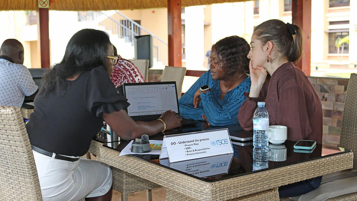 Staff from UNCAP consult with Chief LARRMU,  Elise Metougue on their QMS Policy alignment