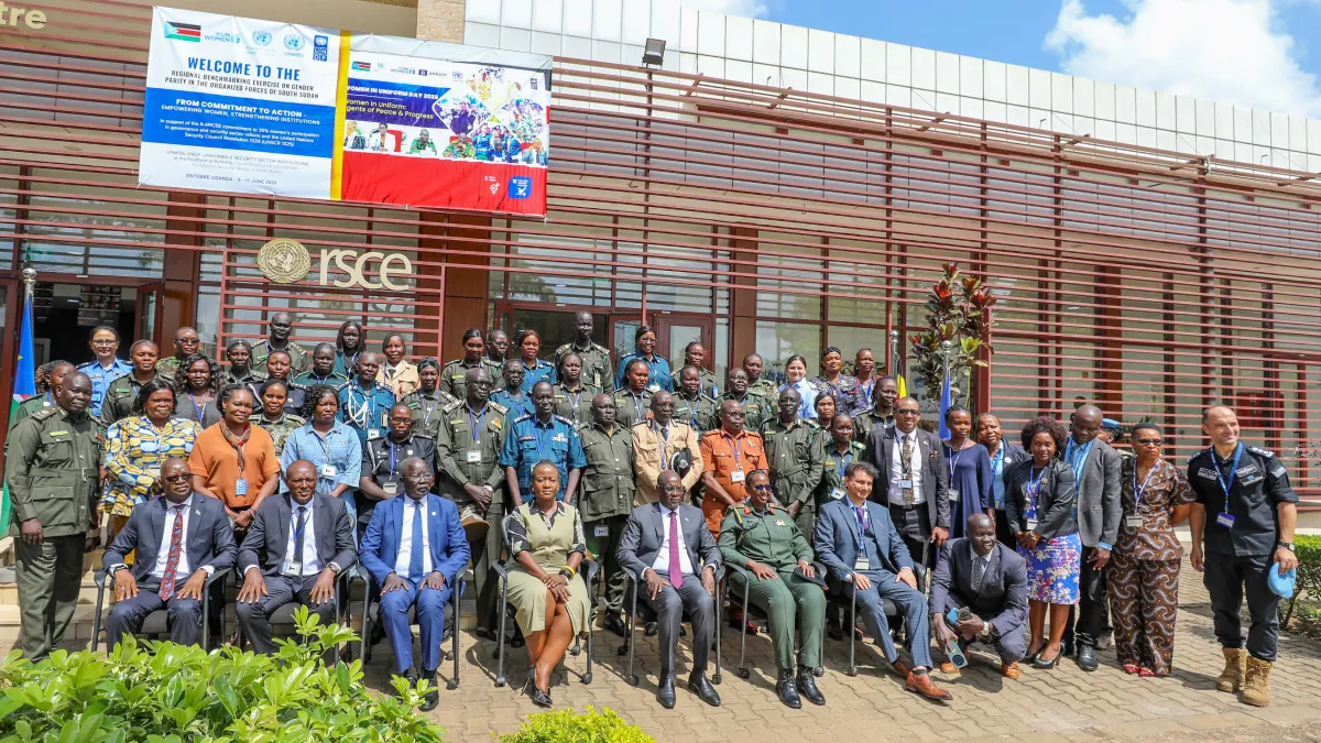 A group photo of participants and guest speakers.