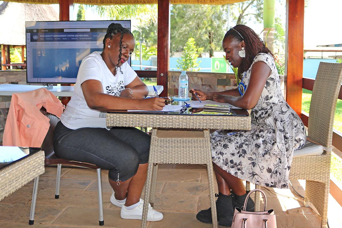 RSCE staff member checks with ISO Consultant on their readiness for the ISO 9001:2015 audit